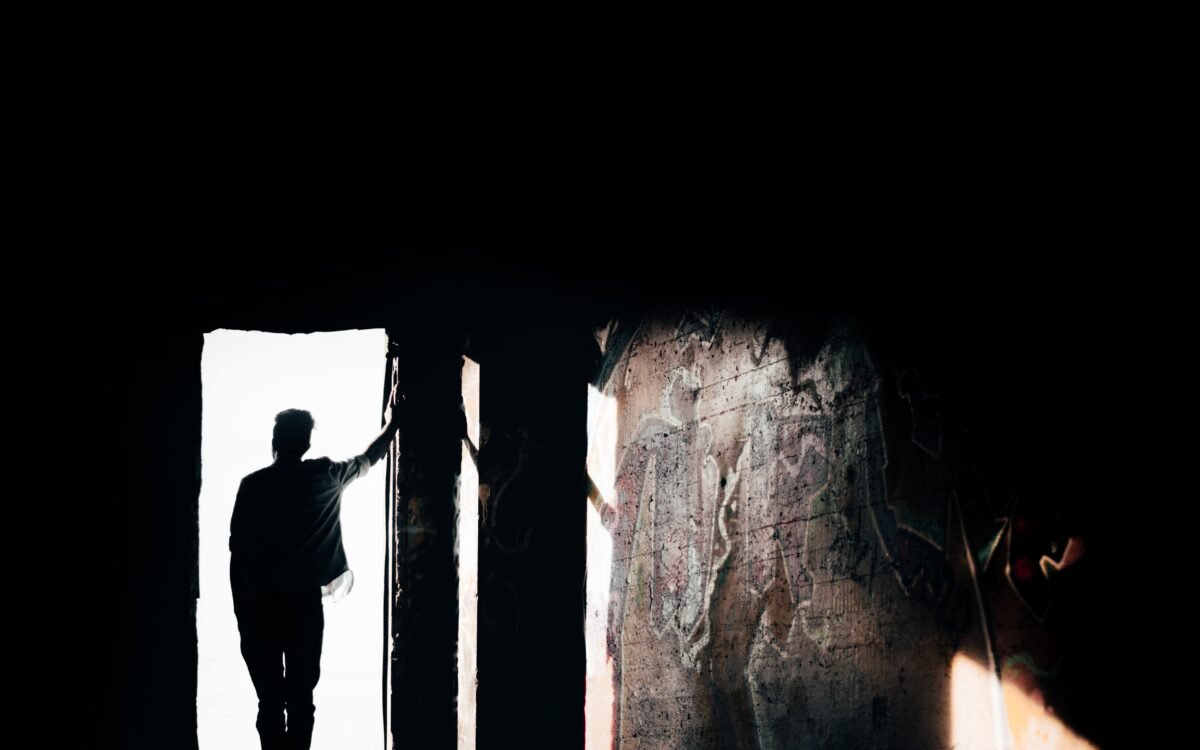 : "Silhouette of Man Standing on the Doorway" di Glaison Francis