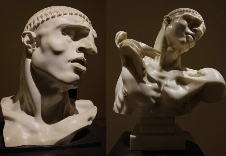 Scultura marmorea di uomo, dettaglio volto e busto